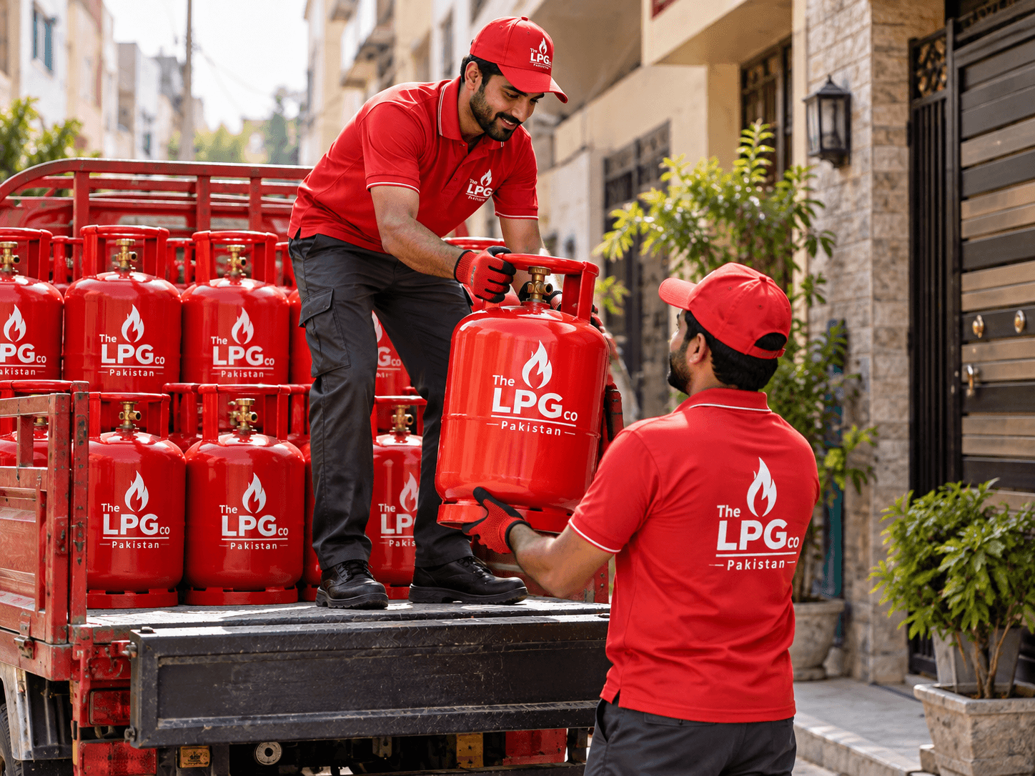 LPG cylinder delivery team handing over a refill cylinder from the truck